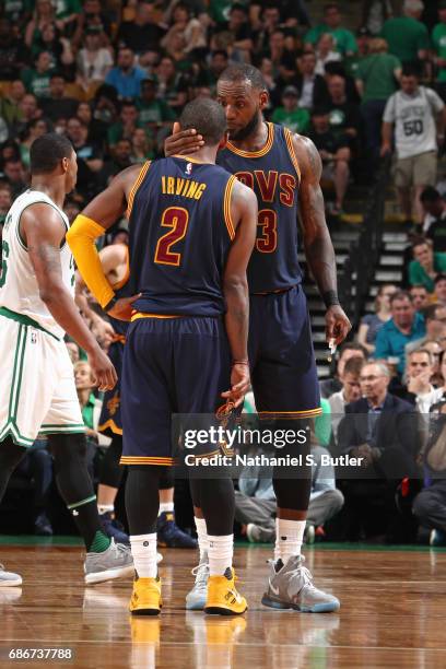 LeBron James and Kyrie Irving of the Cleveland Cavaliers talk in Game One of the Eastern Conference Finals against the Boston Celtics during the 2017...