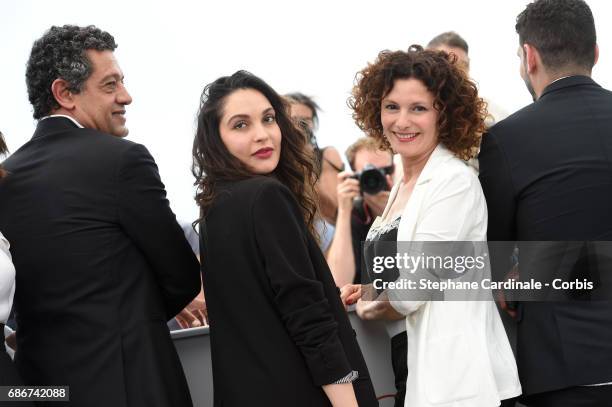 Actors Hassan Kachach, Hania Amar, Nadia Kaci and director Karim Moussaoui attend "Waiting For Swallows " photocall during the 70th annual Cannes...