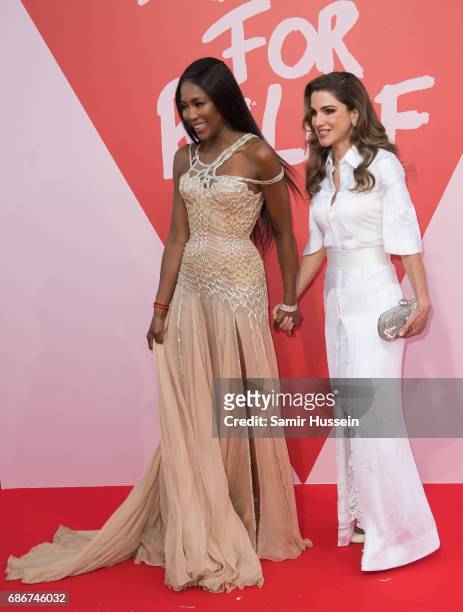 Jordan's Queen Rania and Naomi Campbell attend the Fashion for Relief event during the 70th annual Cannes Film Festival at Aeroport Cannes Mandelieu...