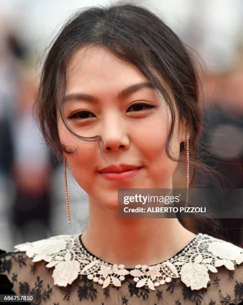 South Korean actress Kim Min-hee poses as she arrives on May 22, 2017 for the screening of the film 'Geu-Hu' at the 70th edition of the Cannes Film...