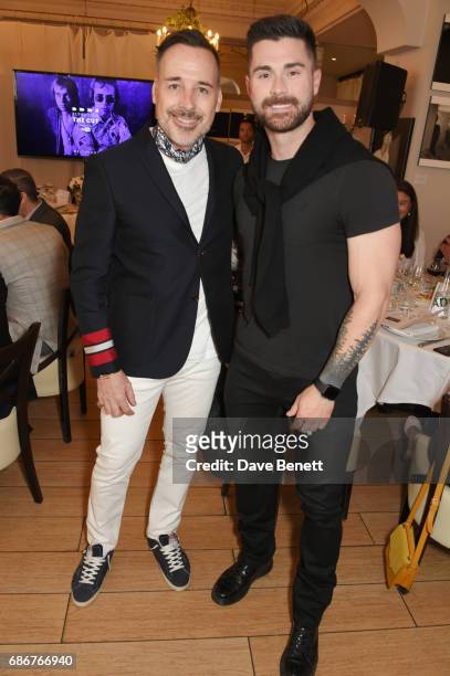 David Furnish and Kyle Krieger attend a lunch celebrating the World Premiere of 'The Cut', Sir Elton John and Bernie Taupin's classics "Rocket Man",...
