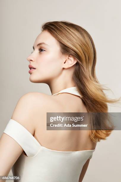 back view of a beautiful woman in a white dress - blonde hair rear white background stock pictures, royalty-free photos & images