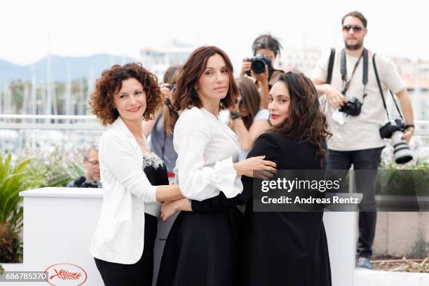 Nadia Kaci, Aure Atika and Hania Amar attend the "Waiting For Swallows " photocall during the 70th annual Cannes Film Festival at Palais des...