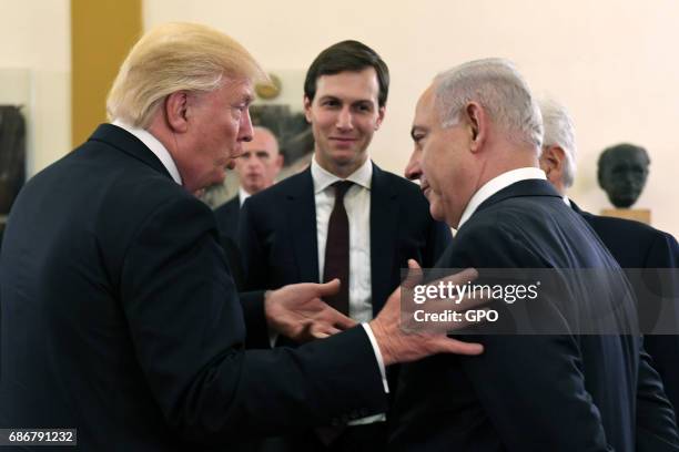 In this handout photo provided by the Israel Government Press Office , US President Donald J Trump and White House senior adviser Jared Kushner meet...