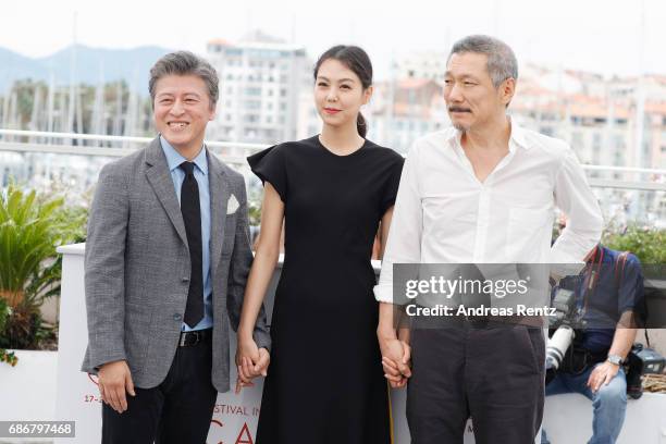 Kwon Hae-hyo, Kim Min-hee and director Hong Sangsoo attend the "The Day After " photocall during the 70th annual Cannes Film Festival on May 22, 2017...