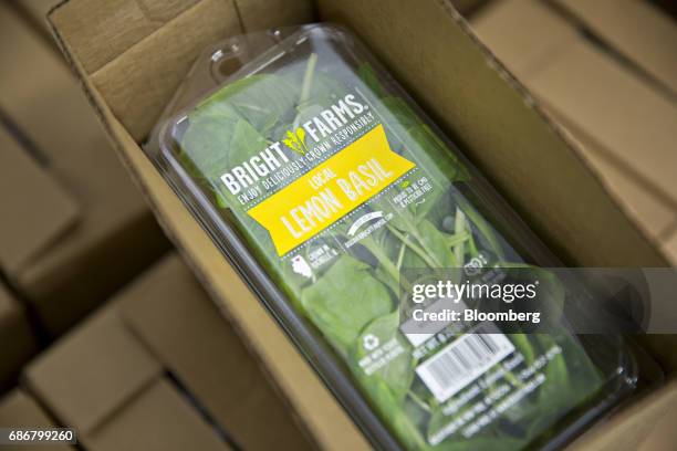 Packages of lemon basil sit in a box at the BrightFarms Inc. Chicagoland greenhouse in Rochelle, Illinois, U.S., on Friday, May 12, 2017. The...