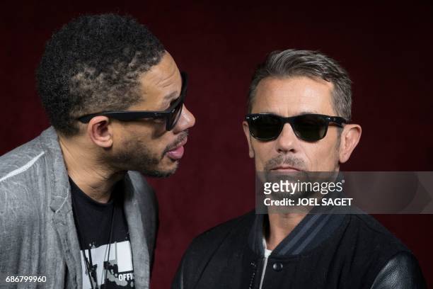 French rappers of the band Supreme NTM, Didier Morville, aka JoeyStarr , and Bruno Lopes, aka Kool Shen , pose during a photo session in Paris on May...