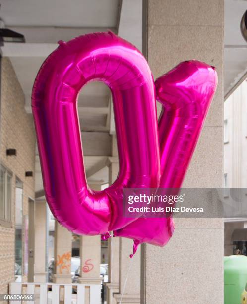 balloons in shape of numbers '1' and '0' - number 2 balloon stock pictures, royalty-free photos & images