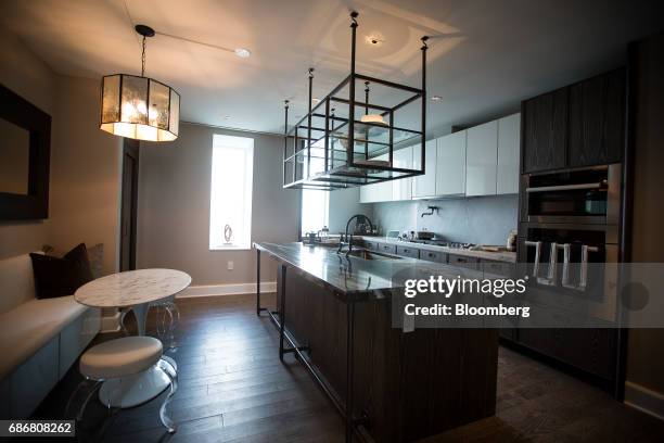 Furnished kitchen is seen in a model unit inside Madison Square Park Tower at 45 East 22nd Street in the Flatiron District of New York, U.S., on...