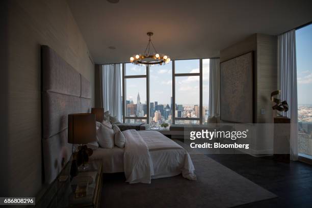 Furnished bedroom is seen in a model unit inside Madison Square Park Tower at 45 East 22nd Street in the Flatiron District of New York, U.S., on...