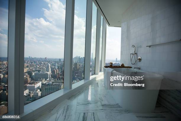 Staged bathroom is seen in a model unit inside Madison Square Park Tower at 45 East 22nd Street in the Flatiron District of New York, U.S., on...