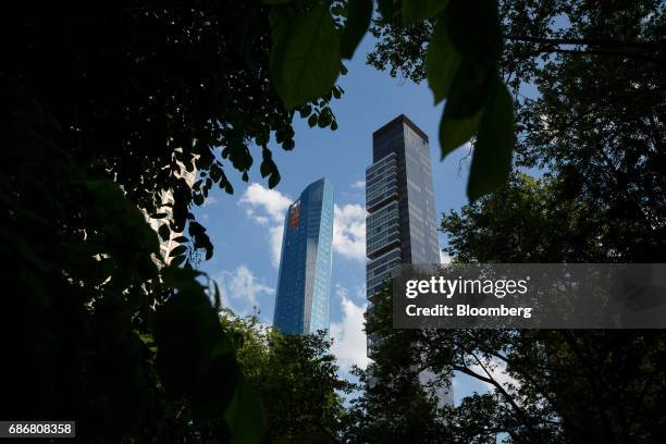 The Madison Square Park Tower, left, stands next to One Madison Park in the Flatiron District of New York, U.S., on Thursday, May 18, 2017. Madison...