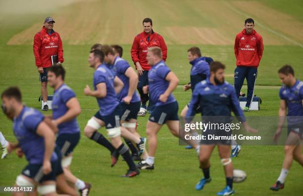 Limerick , Ireland - 22 May 2017; Munster defence coach Jacques Nienaber, director of rugby Rassie Erasmus, and technical coach Felix Jones during...