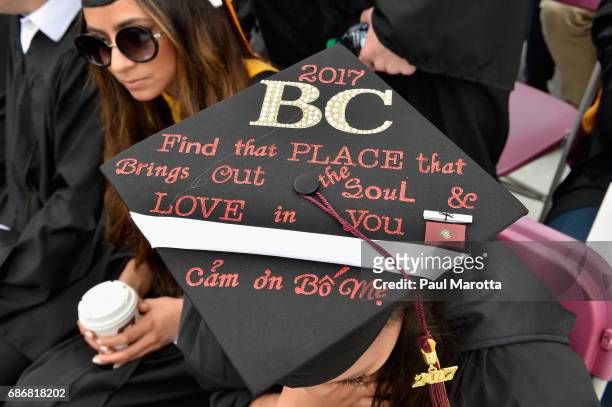 Decorated Commencement Caps at the Boston College 2017 141st Commencement Exercises at Boston College Alumni Stadium on May 22, 2017 in Boston,...