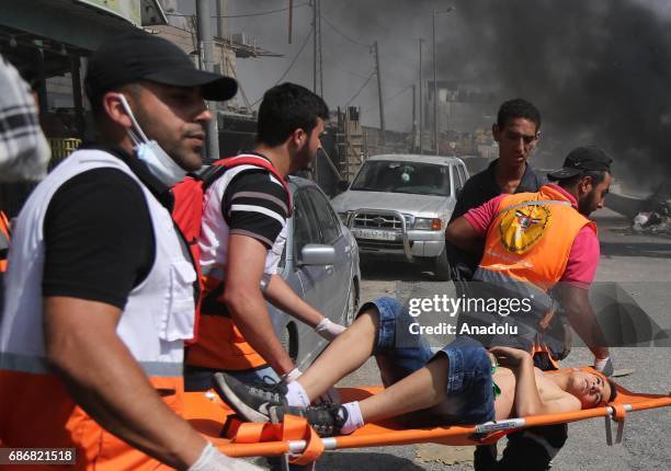 Palestinian demonstrator is being hospitalized after getting injured in clashes with Israeli soldiers as soldiers intervened in a demonstration in...