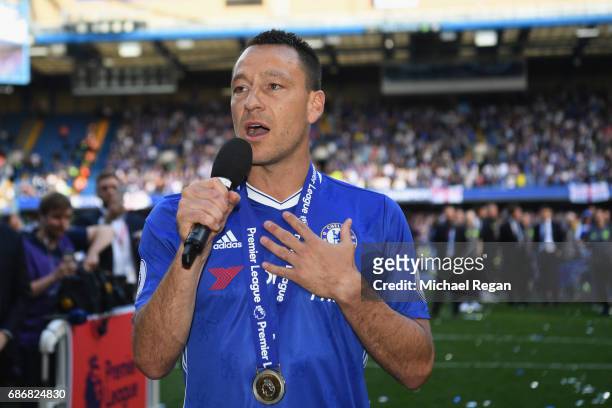 John Terry of Chelsea speaks to the crowd after the Premier League match between Chelsea and Sunderland at Stamford Bridge on May 21, 2017 in London,...