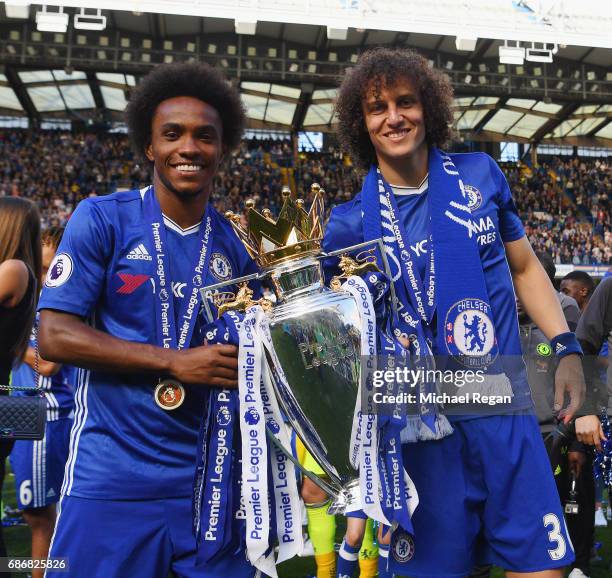 Willian and david Luiz of Chelsea pose with the Premier League trophy after the Premier League match between Chelsea and Sunderland at Stamford...