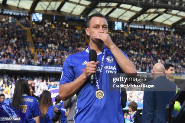 John Terry of Chelsea speaks to the crowd after the Premier League match between Chelsea and Sunderland at Stamford Bridge on May 21, 2017 in London,...