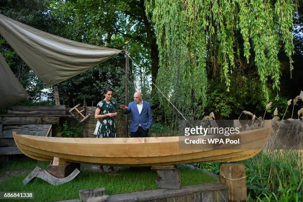Catherine, Duchess of Cambridge is shown the IBTC Lowestoft: Broadland Boatbuilder's Garden as she visits the RHS Chelsea Flower Show press day at...