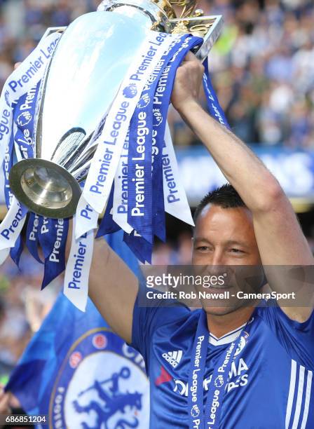 Chelsea's John Terry with the trophy during the Premier League match between Chelsea and Sunderland at Stamford Bridge on May 21, 2017 in London,...