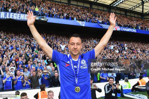 John Terry of Chelsea salutes the crowd after the Premier League match between Chelsea and Sunderland at Stamford Bridge on May 21, 2017 in London,...