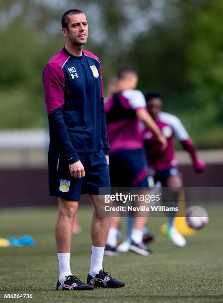 Mark Delaney coach of Aston Villa in action during a Aston Villa U23's training session at the club's training ground at Bodymoor Heath on May 22,...