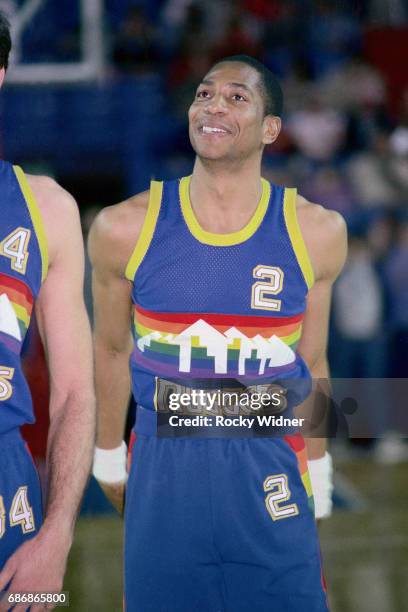 Alex English of the Denver Nuggets smiles against the Sacramento Kings on December 4, 1985 at Arco Arena in Sacramento, California NOTE TO USER: User...