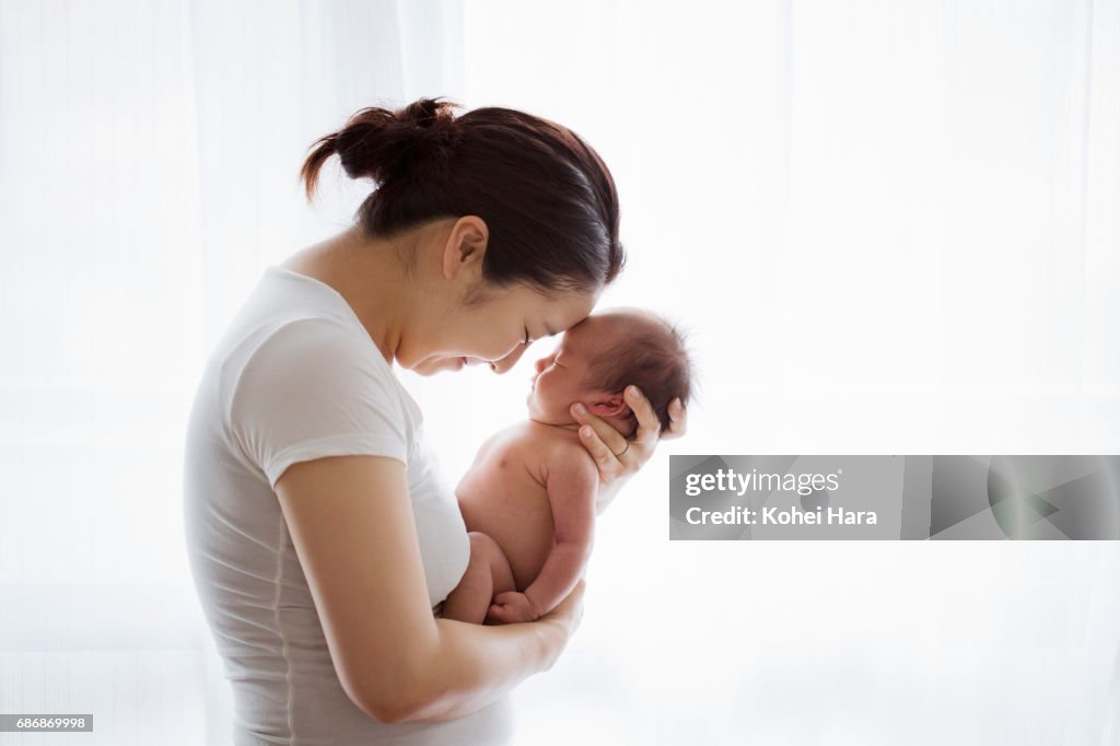 Mother and baby relaxed at home