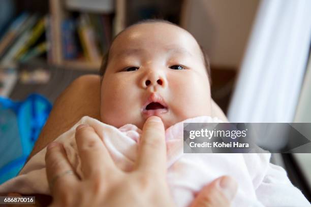 Father and baby relaxed at home