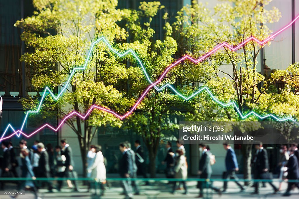 Multi layered businessmen with line graph