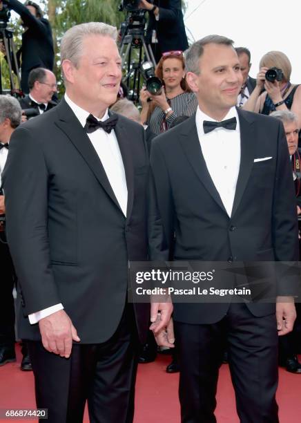 Al Gore and Jon Shenk attend the "An Inconvenient Truth" premiere during the 70th annual Cannes Film Festival at Palais des Festivals on May 22, 2017...