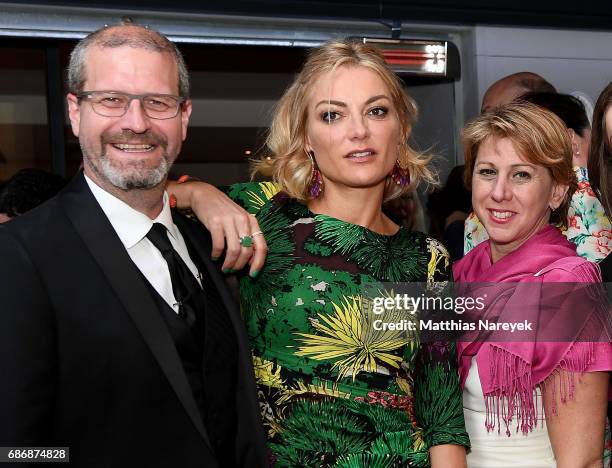 Keith Simanton, Lucy Walker and Sharon Waxman attend IMDb's 2017 Cannes dinner party at Table 22 on May 22, 2017 in Cannes, France.