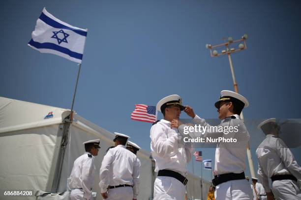 Cadets of the Israeli Navy prepare themselves before a welcome ceremony in honour of Trump's arrival at Ben Gurion International Airport in Lod, near...