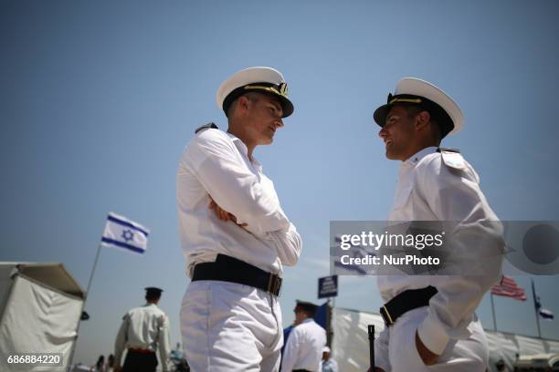 Cadets of the Israeli Navy prepare themselves before a welcome ceremony in honour of Trump's arrival at Ben Gurion International Airport in Lod, near...