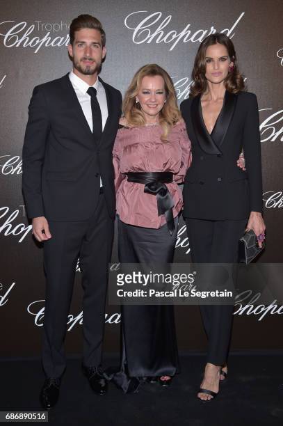 Kevin Trapp, Co-President of Chopard Caroline Scheufele and Izabel Goulart attend the Chopard Trophy photocall at Hotel Martinez on May 22, 2017 in