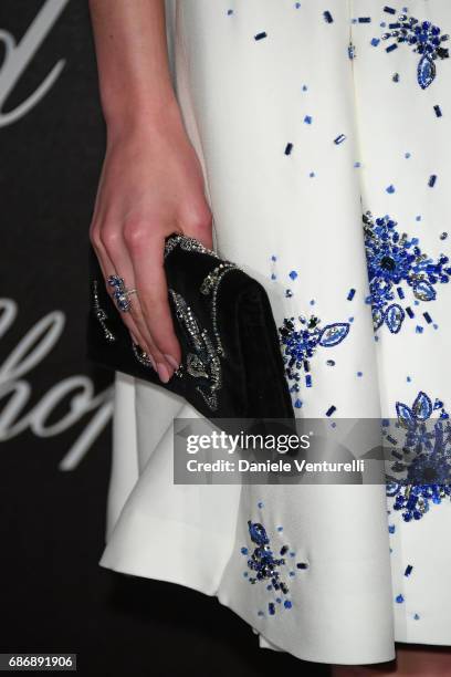 Stacy Martin,bag detail, attends the Chopard Trophy photocall at Hotel Martinez on May 22, 2017 in Cannes, France.