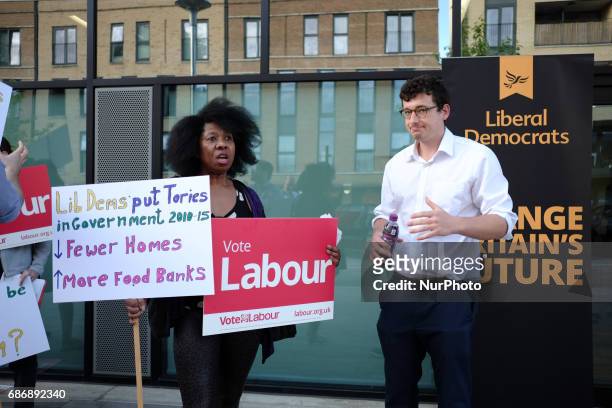 People demonstrate during the meeting of Libreal Democrat leader, Tim Farron at Q&amp;A session in Oval, south London. Mr Farron was confronted by...