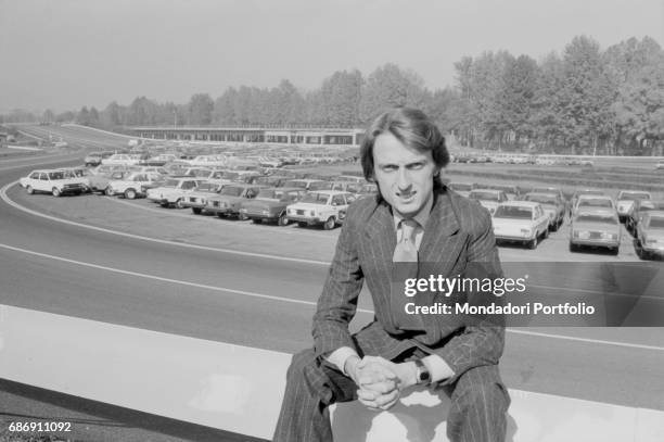 Italian manager and entrepreneur Luca Cordero di Montezemolo sitting in a car fleet. Italy, 1970s