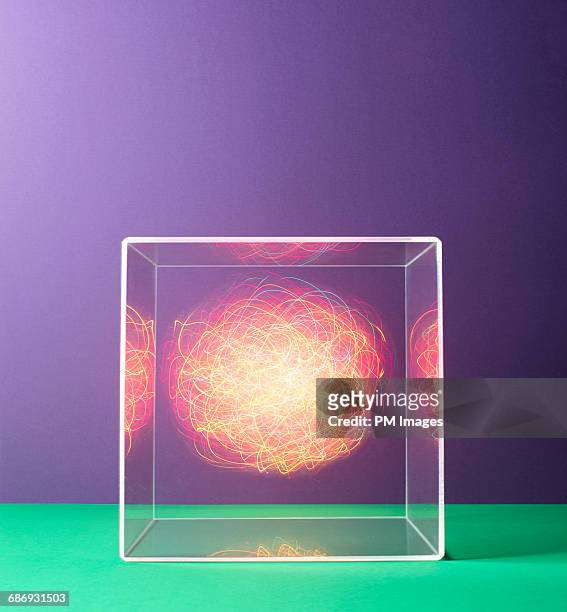 colorful energy in a box - haz de luz fotografías e imágenes de stock