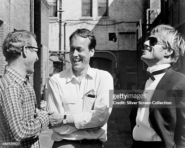 From left to right, actor Paul Newman, director George Roy Hill and actor Robert Redford on the set of 'The Sting', 1973.