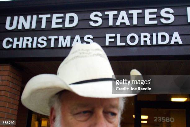 William "Doc" Piper exits from the local post office December 11, 2001 in Christmas, FL. Piper has lived in Christmas for the last 30 years and...