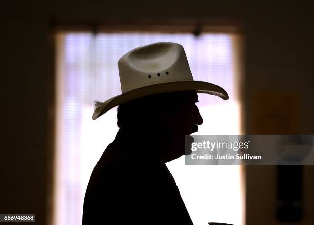 Democratic U.S. Congressional candidate Rob Quist talks with supporters during a Get Out The Vote Canvass Launch event at Labor Temple on May 22,...