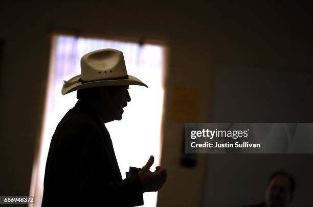 Democratic U.S. Congressional candidate Rob Quist talks with supporters during a Get Out The Vote Canvass Launch event at Labor Temple on May 22,...