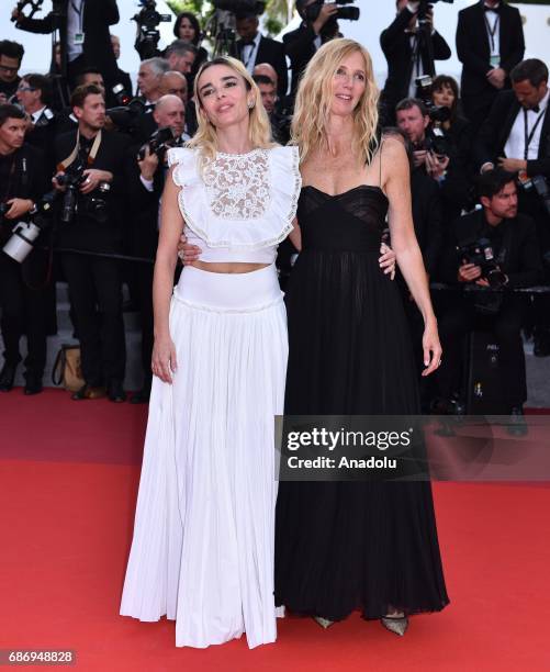 French actress Elodie Bouchez and French actress Sandrine Kiberlain arrive for the premiere of the film 'The Killing of a Sacred Deer' in competition...