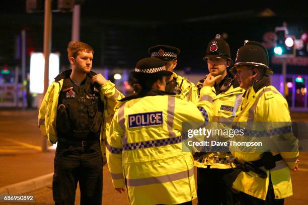 Emergency services arrive close to the Manchester Arena on May 23, 2017 in Manchester, England. An explosion occurred at Manchester Arena as concert...