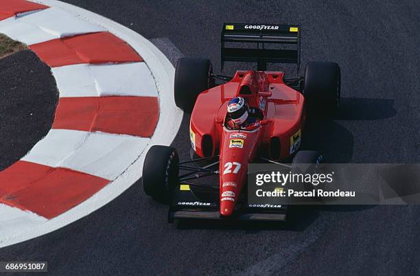Jean Alesi of France drives the Scuderia Ferrari SpA Ferrari F92A Ferrari V12 during practice for the French Grand Prix on 4 July 1992 at the Circuit...