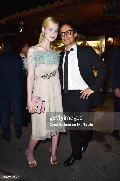 Elle Fanning and Gael Garcia Bernal attend Fondazione Prada Private Dinner during the 70th annual Cannes Film Festival at Restaurant Fred L'Ecailler...