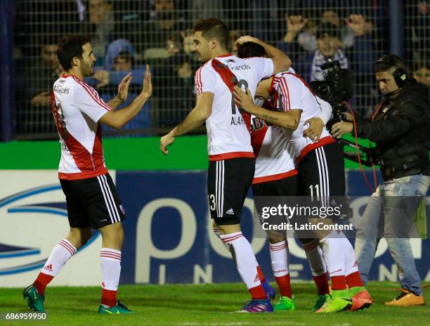 Sebastian Driussi of River Plate celebrates with teammates Camilo Mayada, Lucas Alario and Gonzalo Martinez after scoring the first goal of his team...