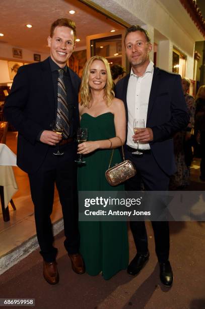 Adam Titchenal, Katie Calhoon and Michael Koperwas attend Fondazione Prada Private Dinner during the 70th annual Cannes Film Festival at Restaurant...