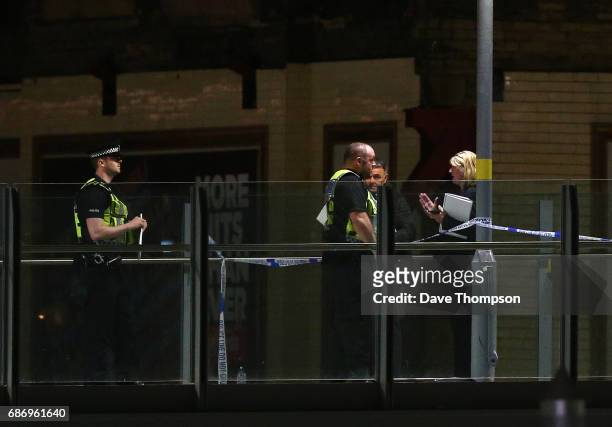 Police corden off an area close to the Box Office entrance to the Manchester Arena on May 23, 2017 in Manchester, England. An explosion occurred at...